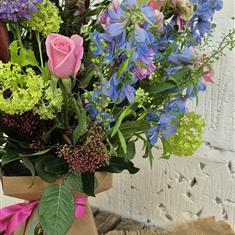 Romantic hand tied with a beautiful scented candle 